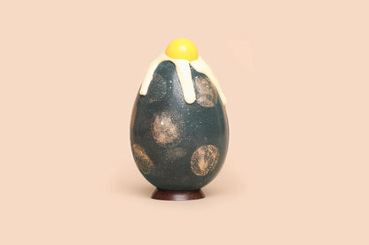 Chocolate egg with a surprise inside, dark chocolate, 54%